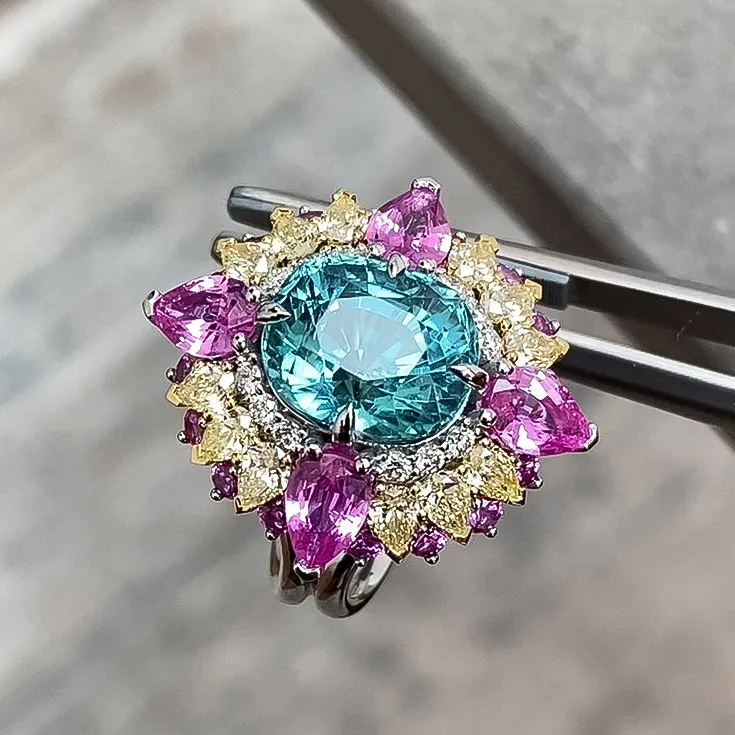 Ring with Lagoon Tourmaline 4.5 ct., Pink and Yellow Sapphires, and colorless Diamonds - picture 