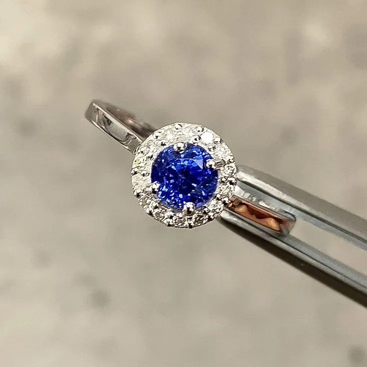 Sapphire Ring 0.7 ct. in a Diamond Halo