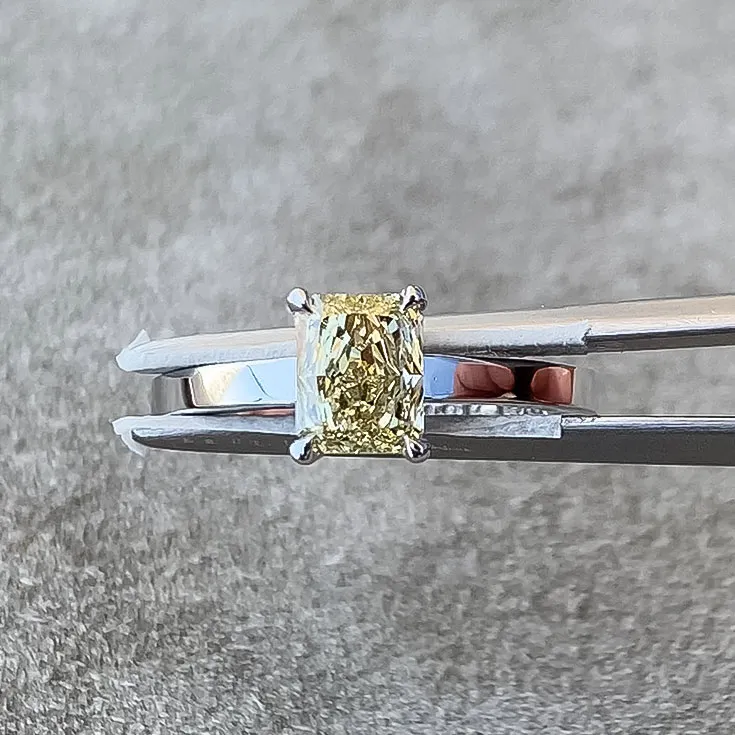 Ring with Fancy Light Yellow Diamond 0.83 ct.