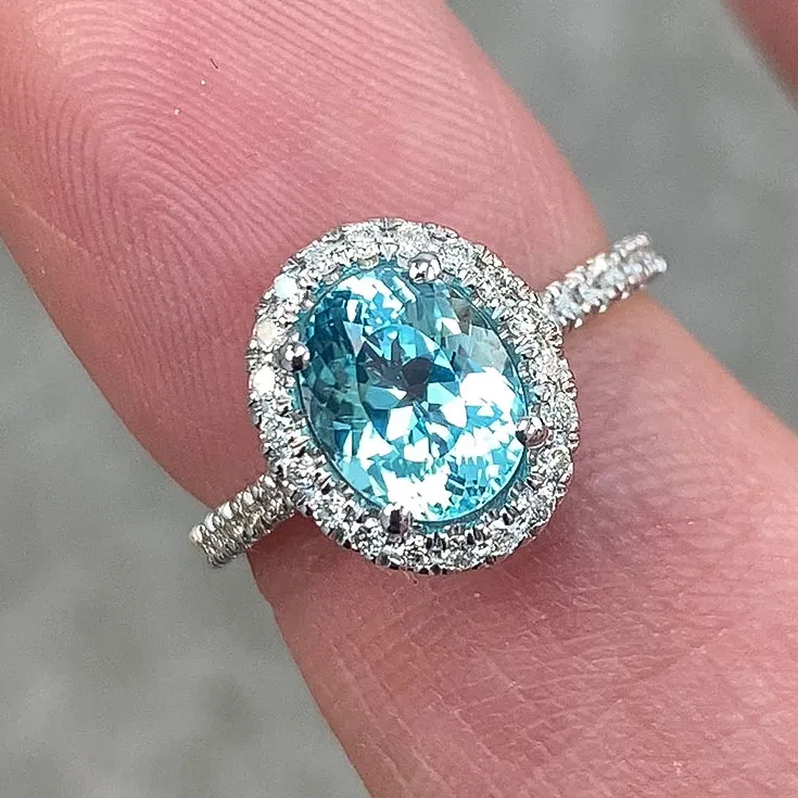 Ring with Paraiba Tourmaline 1.46 ct. and Diamond Halo - picture 