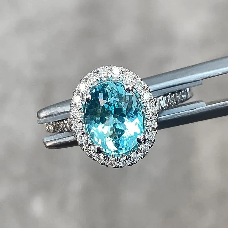 Ring with Paraiba Tourmaline 1.46 ct. and Diamond Halo