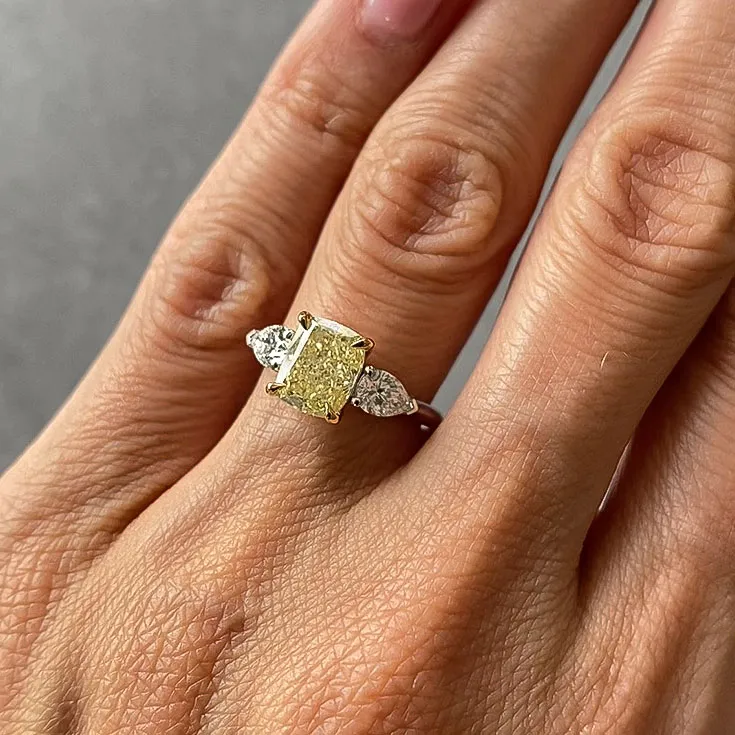 Fancy Light Yellow Diamond Ring - 2.01 ct Center Stone with Colorless Pear Side Diamonds - picture 