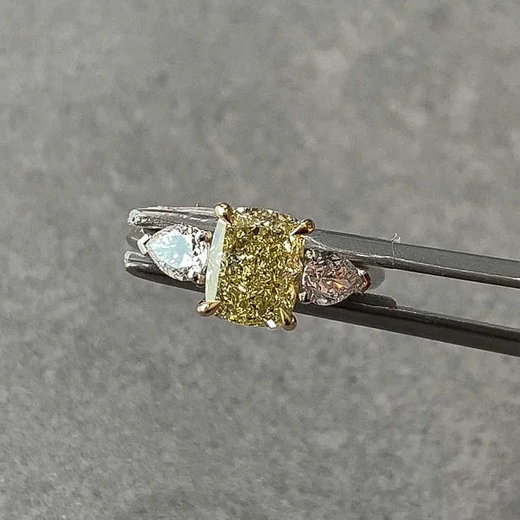 Fancy Light Yellow Diamond Ring - 2.01 ct Center Stone with Colorless Pear Side Diamonds