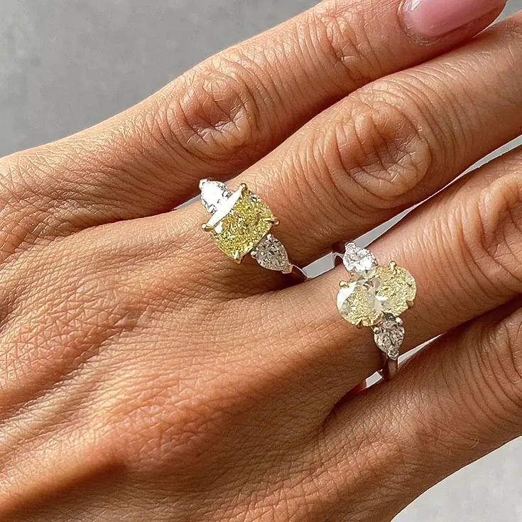 Oval-Cut Diamond Ring — 2.02 ct Center Stone (Color N) with Colorless Pear Side Diamonds - picture 