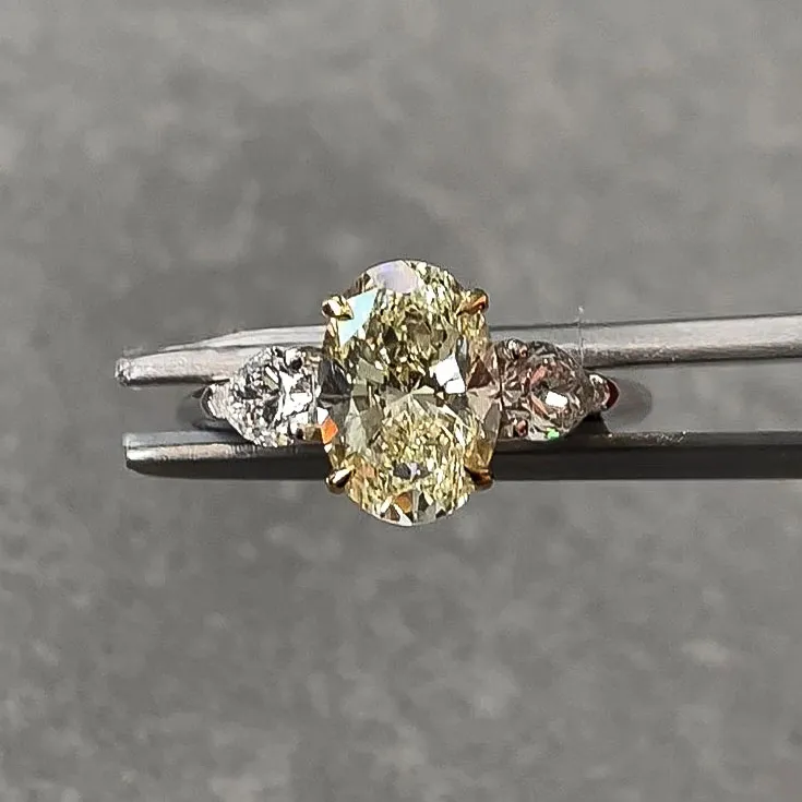 Oval-Cut Diamond Ring — 2.02 ct Center Stone (Color N) with Colorless Pear Side Diamonds