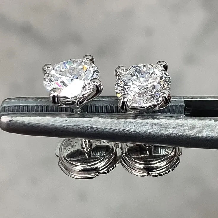 Classic Round Diamond Stud Earrings - 0.7 Carats Each - picture 