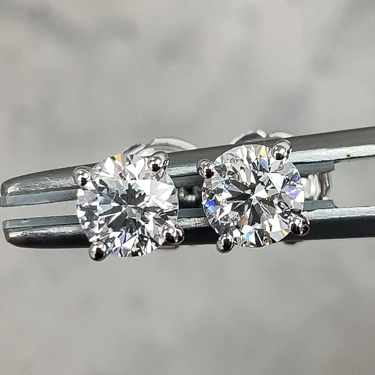 Classic Round Diamond Stud Earrings - 0.7 Carats Each