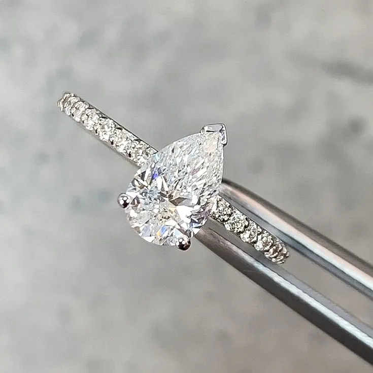 Pear-Shaped Diamond Ring – 1.01 Carats, E VVS1, with Diamond Band