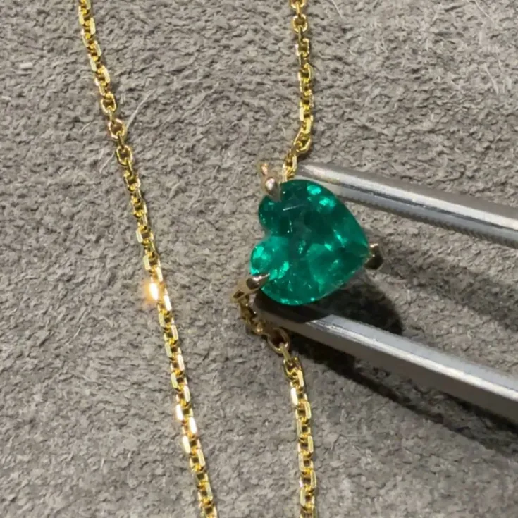 Gold Pendant with Heart-Shaped Emerald 1.58 ct.