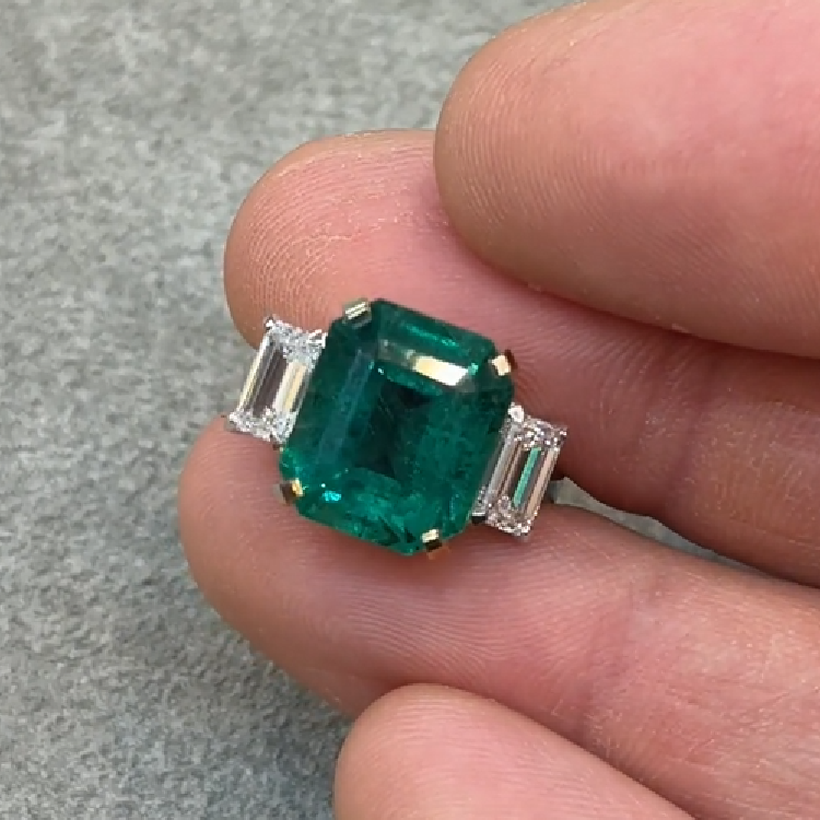 Platinum Ring with Emerald 3.983 ct and Diamonds 0.50 ct.