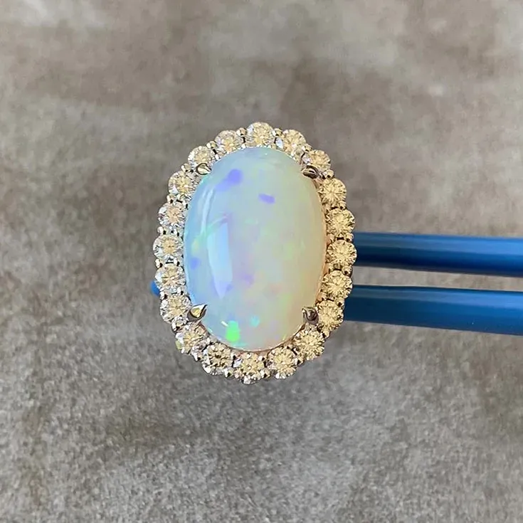Opal Ring 12.8 ct. with set 1.64 ct. Diamonds