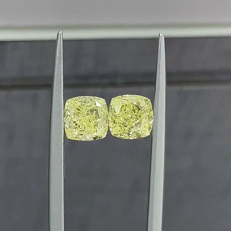  Natural Fancy Light Diamonds 1.15 carat & 1.12 ct.