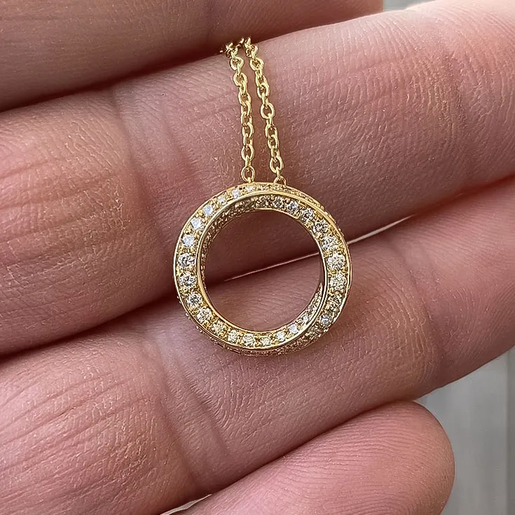 Golden Pendant of Möbius Ribbon with 0.7 ct. Diamonds